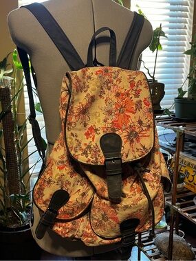 Icing Floral Canvas Backpack with Black Trim and Orange-Pink Flowers